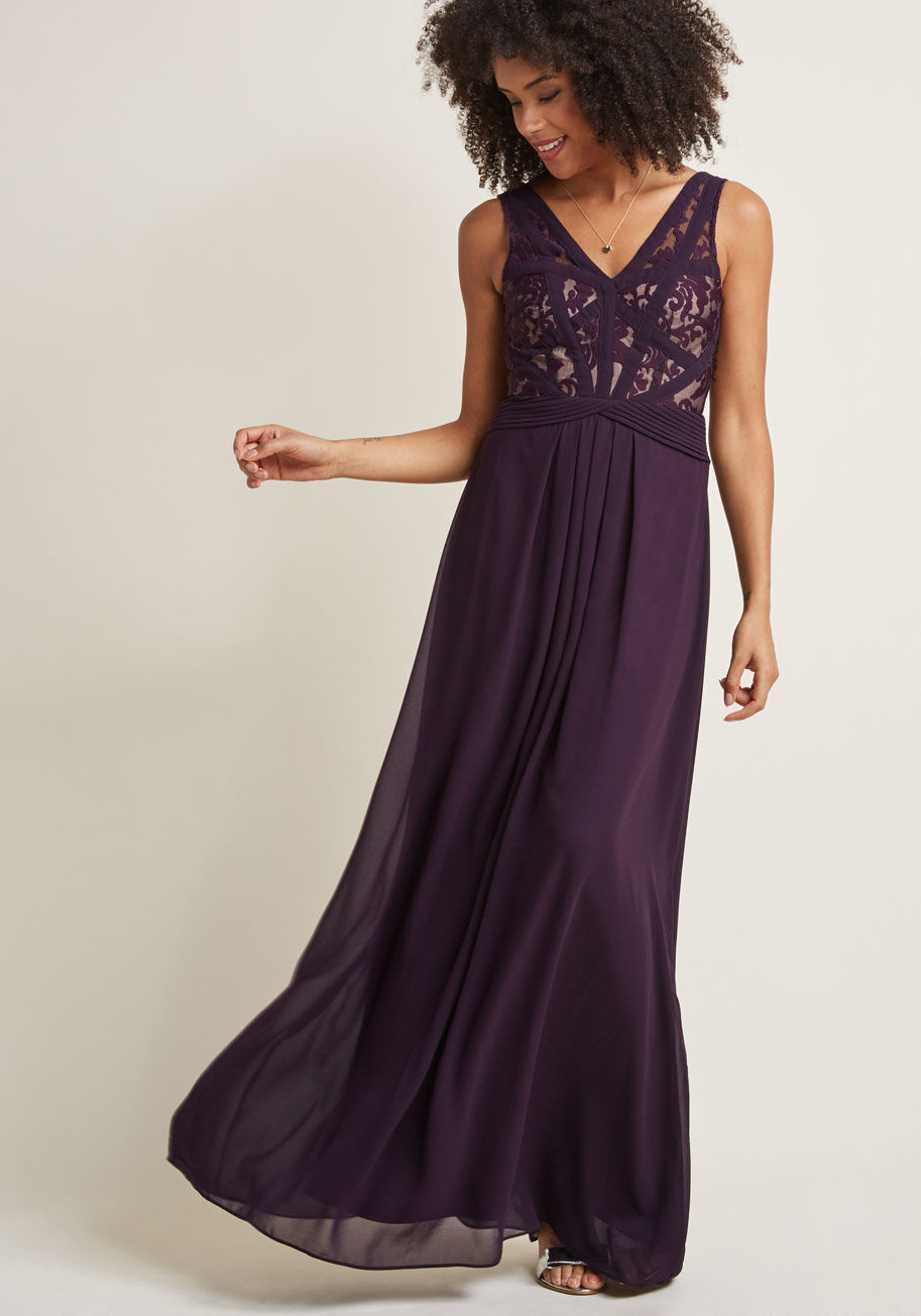 7685 - You may not choose when memories happen, but you can opt to look your best for them with this purple gown. A ModCloth exclusive, this dress is simply stunning with its sheer shoulders and back, an intricately-paneled lace bodice, miniature pleats at the w