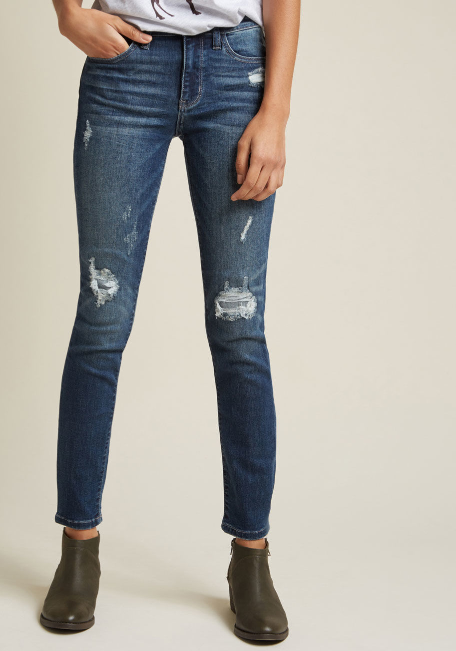 8263 - These distressed skinny jeans aren't just a new wardrobe addition - they're the style sidekick you've been waiting for! With patches at the knees, plenty of pockets, and the perfect amount of stretch, this pair makes for quite the outfit pal.