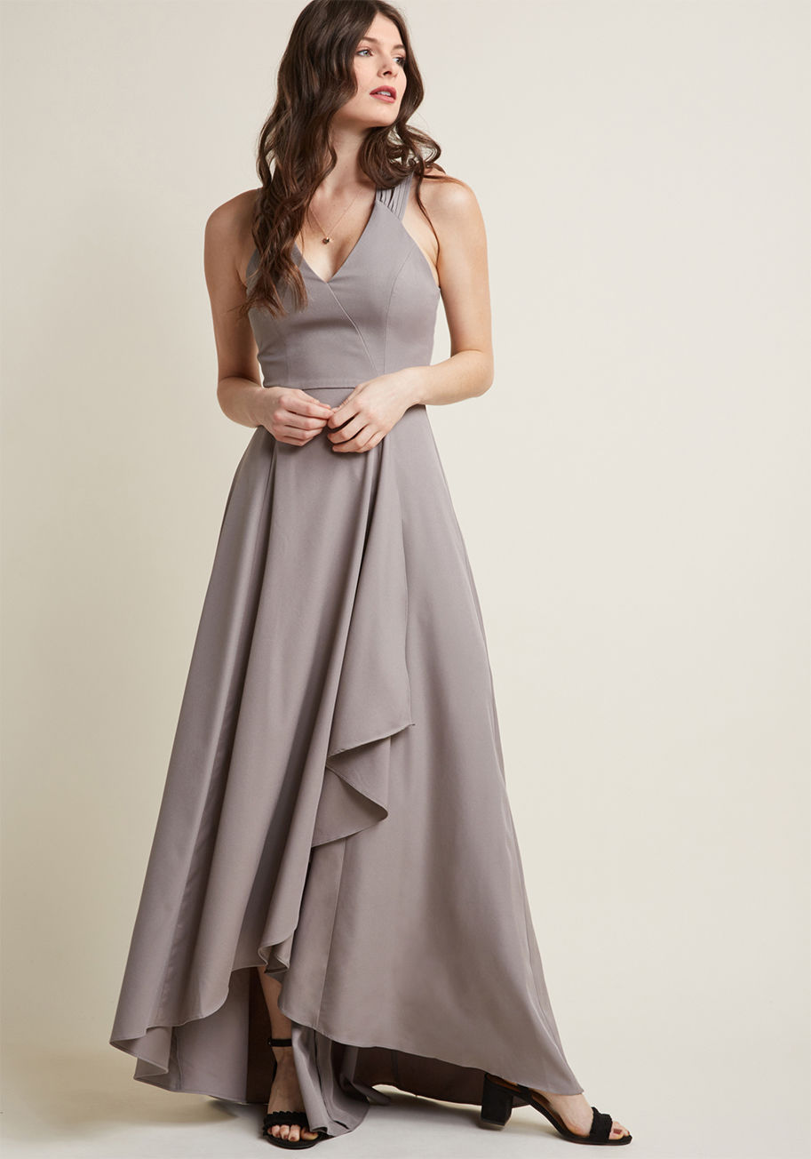 8657 - Match the opulence of vintage chandeliers and a symphony of strings with this grey gown - a ModCloth exclusive. An arch of statement-making straps and a ruffled, tulip-style skirt imbue this floor-length frock with undeniable allure, for they are details 