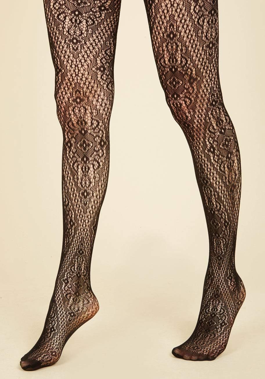 9957 - Donning these intricately adorned tights always puts an extra dash of sass