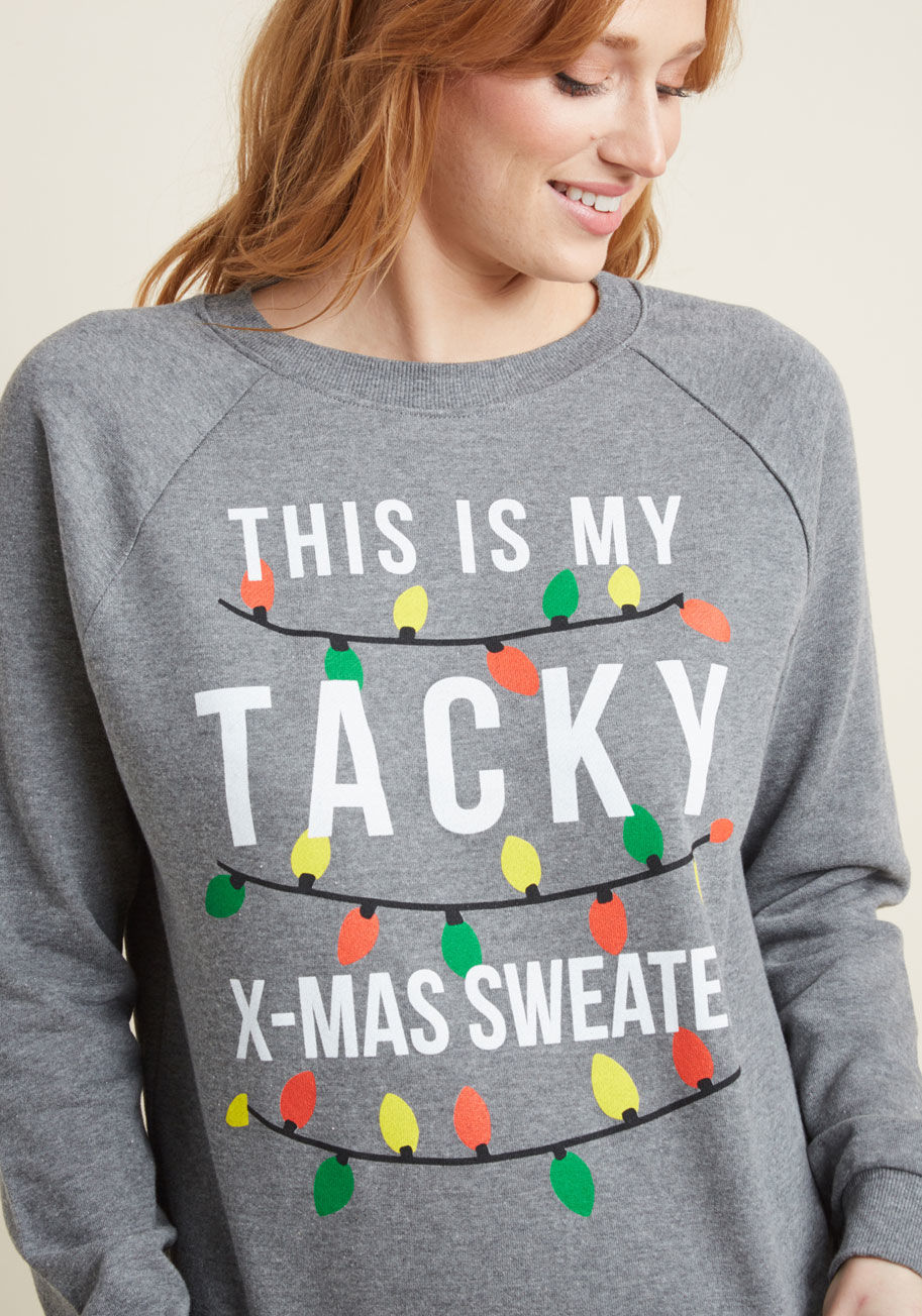 A9367AWB1 - For a look both festive and unexpected, turn to this grey sweatshirt! Bursting with quirk, this graphic pullover lets everyone know you've taken a different approach to holiday style, which will make plenty of spirits bright.