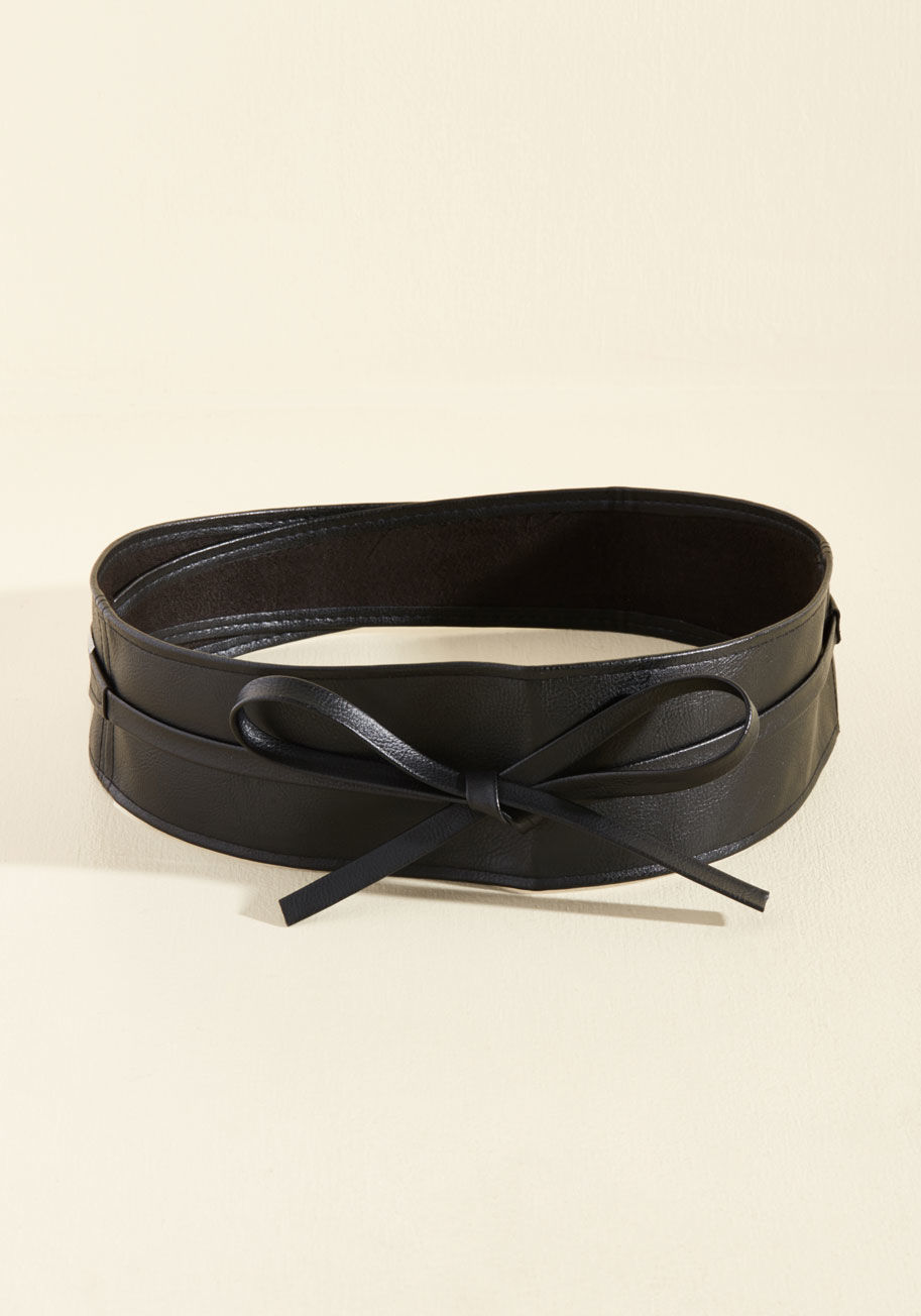 Sport this black belt on the dance floor to help define your fab figure while you're twisting and twirling! This vegan faux-leather sash features a slit on the side, so you can wrap its ends through and tie them by ABT5428