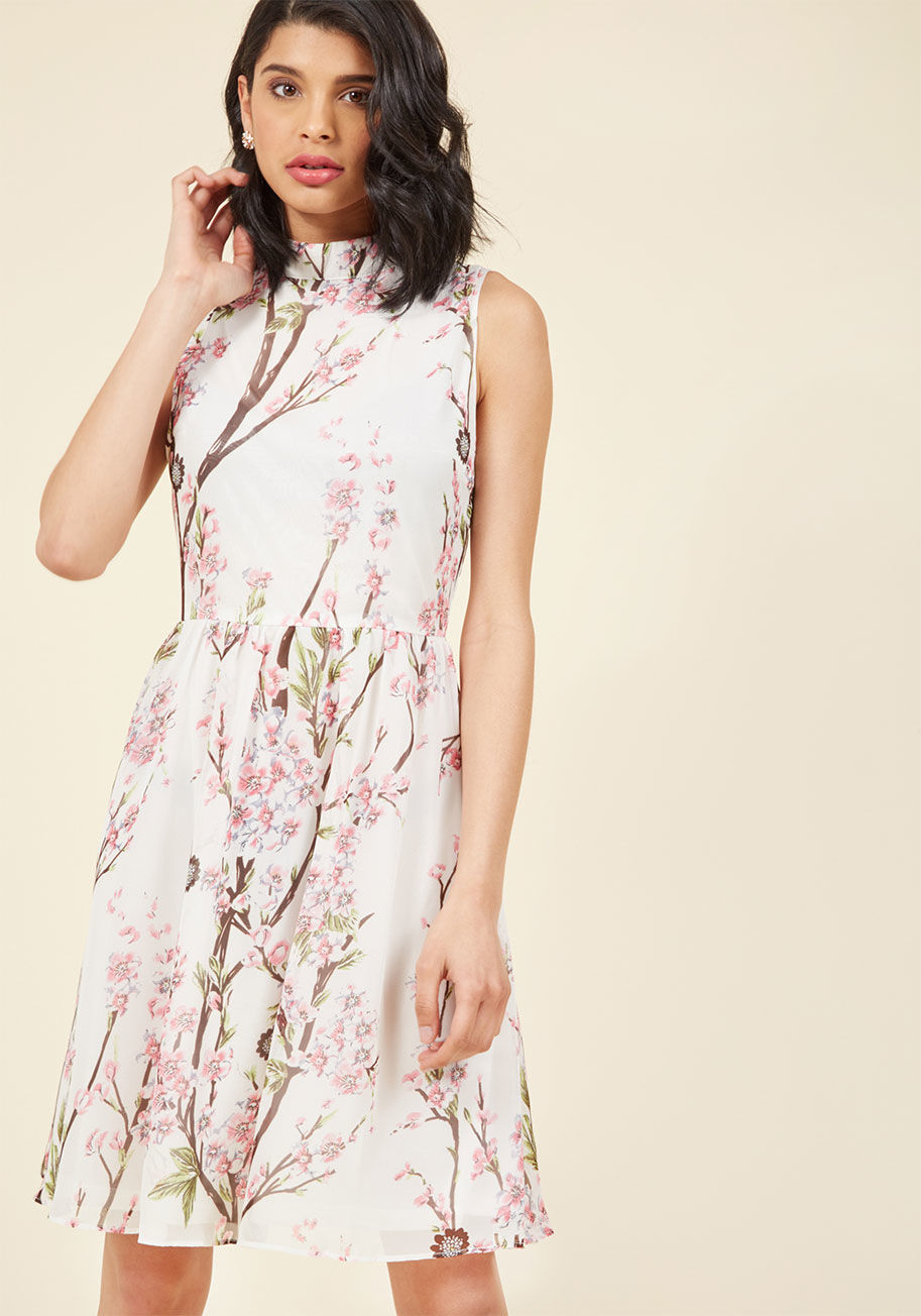 AFA565 - While contemplating the refined quality of this pink dress, you cast your doubts aside and dive right into its lovely look! The mock neckline and classic cut printed with navy birds allow this ModCloth-exclusive frock to bestow you with an utmost elegant 