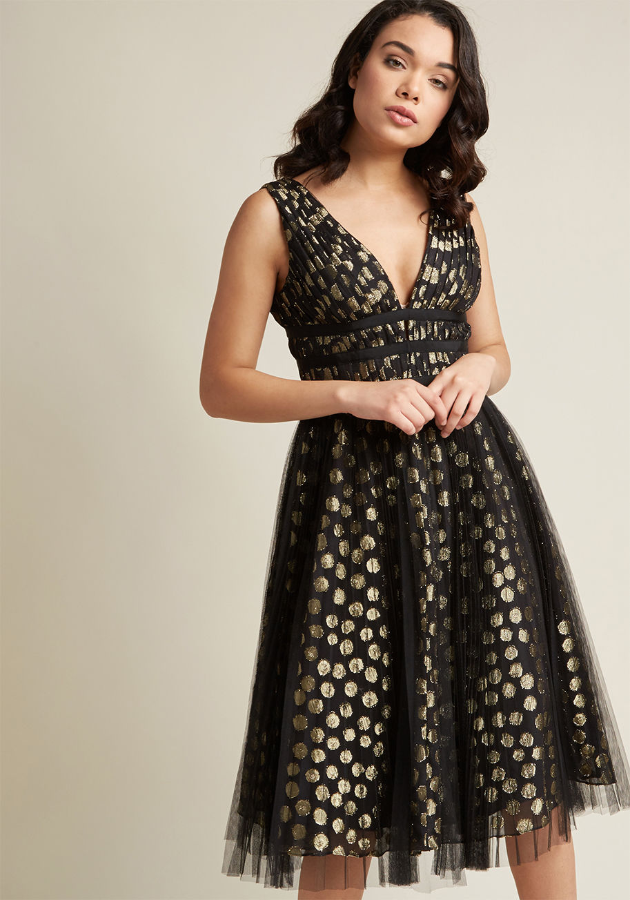 AP1E202528 - This black midi dress by Adrianna Papell abounds with elegant intricacies! A flowing overlay of delicate, pleated mesh softens the metallic gold dots of this fantastic fit and flare, as a plunging neckline intersected by a trio of grosgrain ribbons and sw