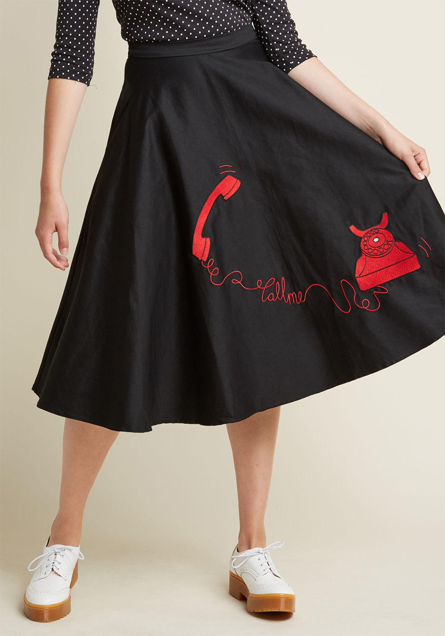 AW170308A - Will you debut this black skirt as part of a full-blown pinup ensemble or will you introduce its midi silhouette to the world with a minimalist blouse up top? Don't look at us, that's your decision to make! Delighting all who notice with pockets and a red