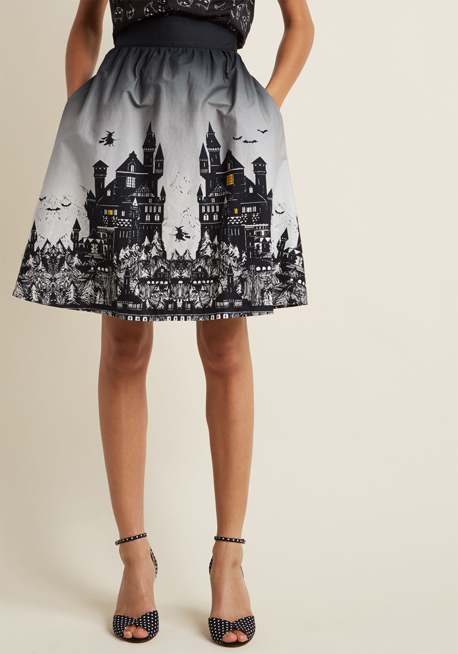 B7073G - You ain't ashamed of your eerie tastes, so hop into this high-waisted skirt and showcase your haute hocus pocus! Part of our ModCloth namesake label, this pocketed bottom parades a spellbinding haunted house print that'll only boost your chilling levels o