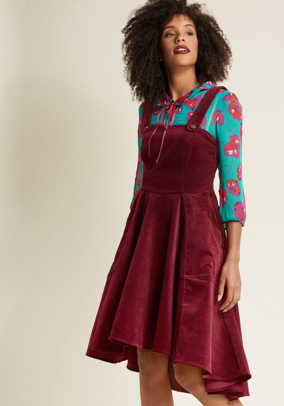 BBAW160804 - Highlight that alluring personality of yours with this burgundy midi dress! A piece that's a joy to layer or flaunt on its own, this jumper-style frock flaunts substantial straps, deep pockets, and a fit-and-flare silhouette accentuated by a high-low heml