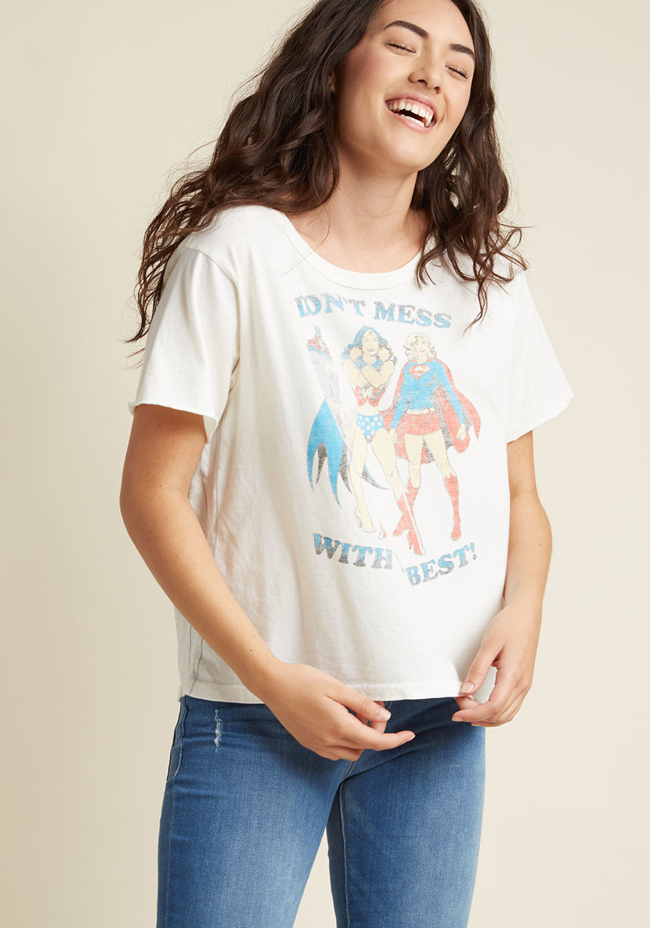 BW1711 - This cotton T-shirt is so full of action-packed glory, you just won't want to keep it to yourself! A boxy cut, an iconic graphic, and unique, hand-washed fabric equip this geek-chic tee with casual comfort, undeniable coolness, and an empowering vibe you'