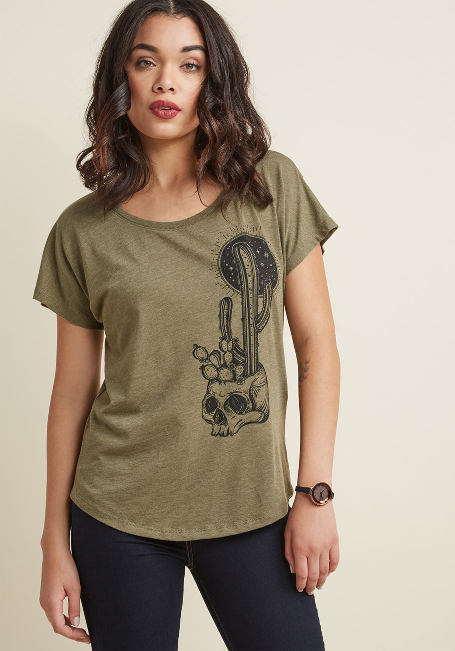 Cactus Skull - Expect enthusiasm from others whenever you flaunt this olive green graphic tee! A ModCloth exclusive, this loose-fitting top will blossom with positivity for its black screen print of a succulent skull planter.