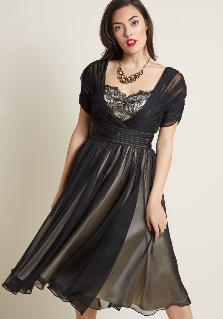 Cafe Noir - With every wear of this black fit and flare dress, sartorial stardom is absolutely achieved! By Tatyana, this nostalgic ensemble touts a sheer bodice overlay to be worn either on or off the shoulder, which then delicately envelops the lace bustline and ca