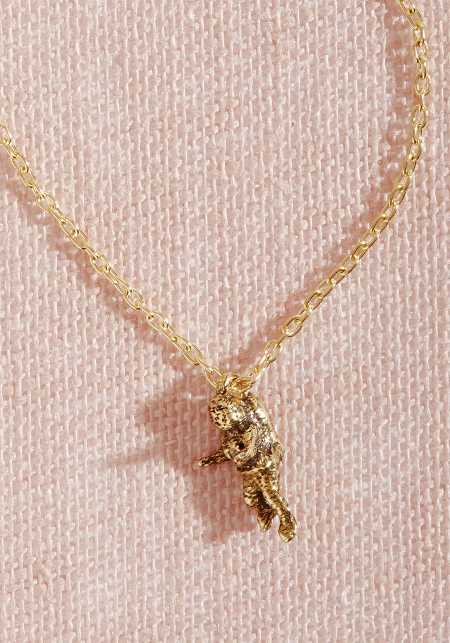 CH-Astro-SM-BR - Once you add this gold necklace to your accessories collection, you'll be eager to explore every way it can elevate your outfits! Supported by a delicate gold chain, this accessory's 3D printed pendant is shaped like an adorable little astronaut, making f