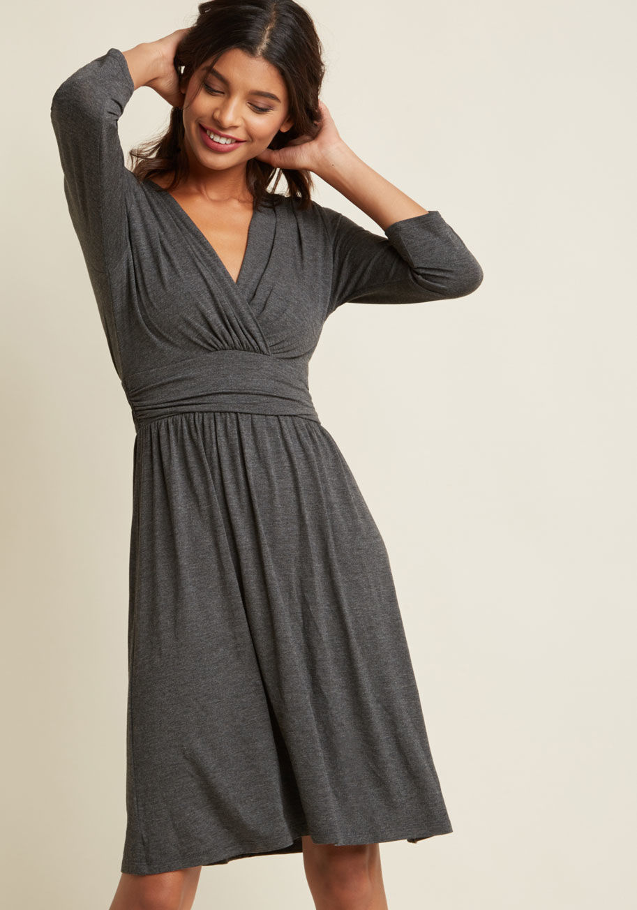 D10109C - When errands, a client meeting, and dinner downtown are all on the agenda, what's a gal to wear? This grey dress is precisely the pick for chaotic days, for its cropped sleeves, wrap-style silhouette, and comfortable knit fabric keep you looking lovely fr