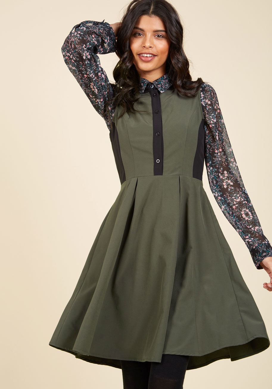 D15147 - Pour a pinot for you and your partner, and get down to collaborating with this army green dress driving your focus and fashionable professionalism! Boasting black contrast, a buttoned bodice, princess seams, and a pleated waist, this sleeveless, ModCloth-