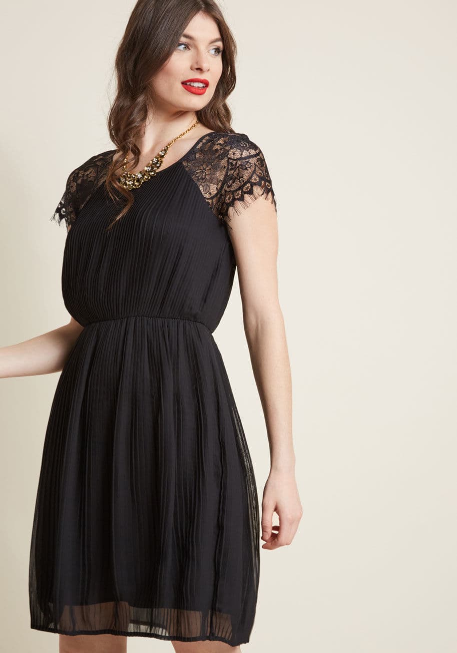 D165a - This A-line dress dons tasteful top-to-bottom pleats, but that's just the start of it. Further charmed with sheer lace shoulders 'n' cap sleeves, a back keyhole, and an elasticized waistband, this ModCloth-exclusive frock is sure to find you feeling your 