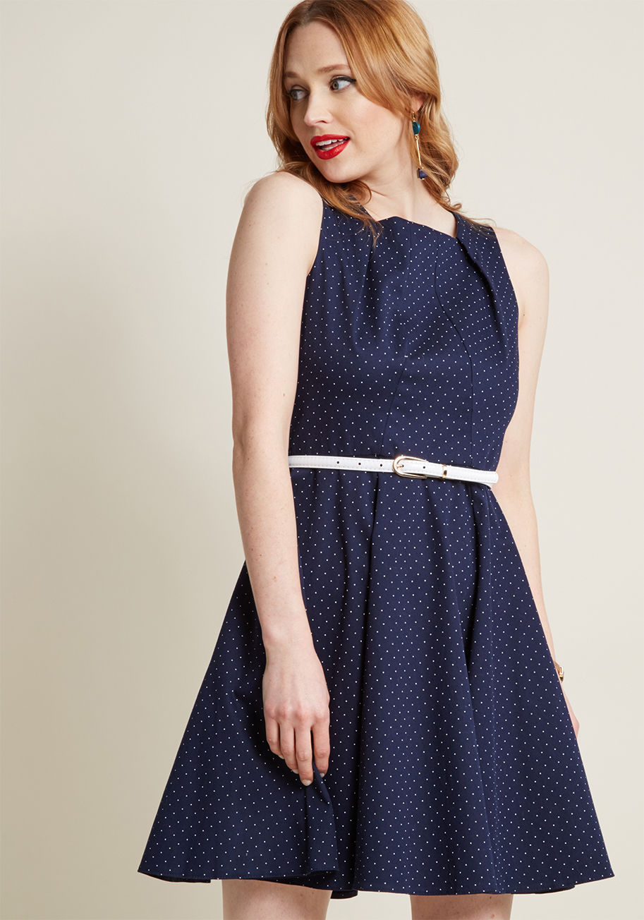 D3739 - For this trip, let your unique style truly blossom with this structured navy dress from Closet London. As you stroll through the garden squares