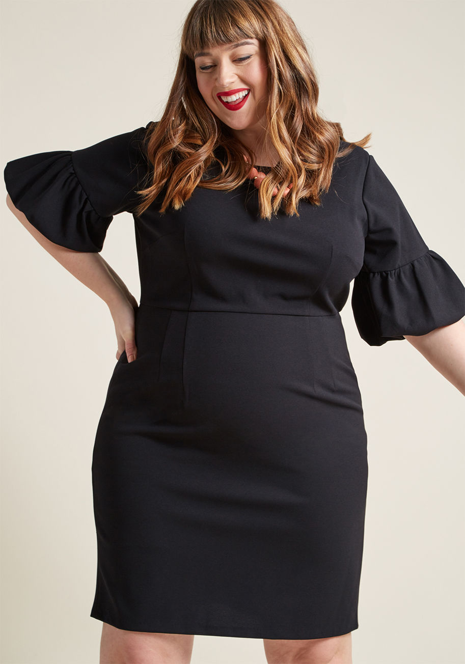 D5663M - This black sheath dress is equal parts class and sass! A tailored frock by Donna Morgan, this fancy dress flaunts 3/4-length sleeves with bubble ruffles that bring out your elegant edge.