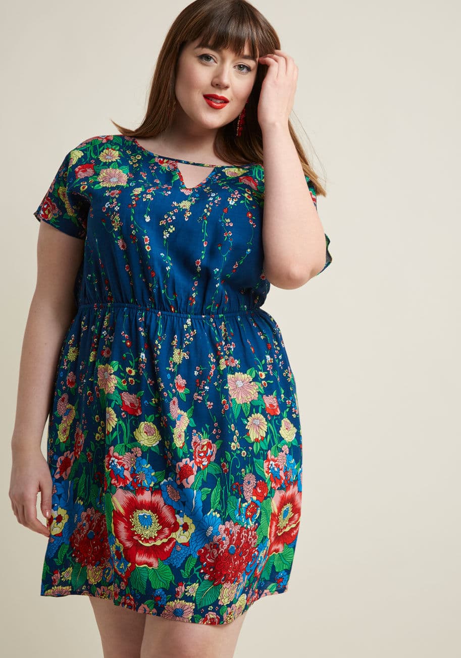 D61689 - Your recipe for an afternoon of pure bliss all begins with this floral mini dress! A ModCloth exclusive, this breezy number encourages frolic and fun with its triangular neckline cutout, seamless short sleeves, gathered waist, and gorgeous botanical print