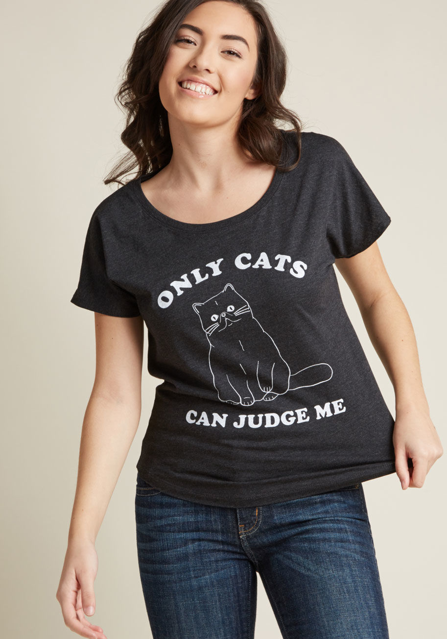 D7010 - You know cats are as smart as they are sweet, and you ain't afraid to flaunt it with this black graphic tee! Featuring a white screen print proclaiming feline's acumen of your incredible style, this wide-neck top shows the world that your opinion of cats 