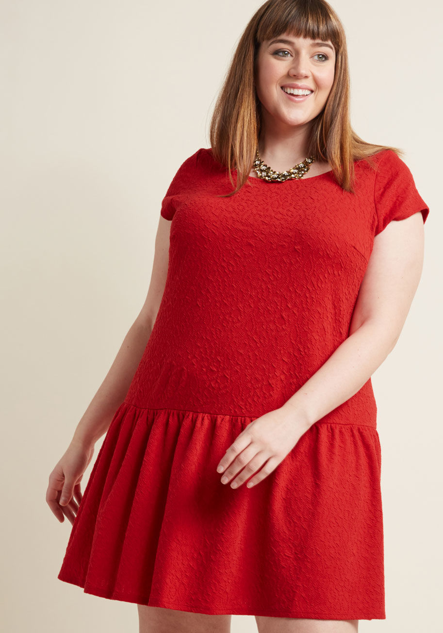 D8930 - Be the start of stylish conversation by wearing this red dress to your upcoming event! Detailed with fashionable fineries such as cap sleeves, a V-backline, a dropped waist, and beautifully embossed fabric, this ModCloth-exclusive frock is guaranteed atte