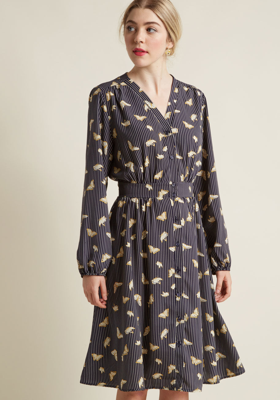 D905-01 - Once you discover this navy shirt dress performs perfectly at the office and beyond, you'll be quick to promote it to your workwear rotation! A ModCloth exclusive, this collarless frock touts light gathering at the shoulders and waist, elasticized cuffs, 