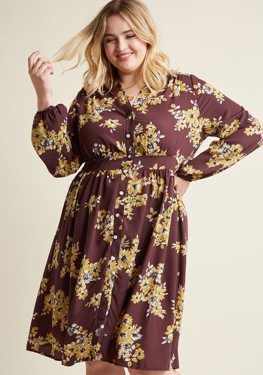 D905 - Once you discover this purple shirt dress performs perfectly at the office and beyond, you'll be quick to promote it to your workwear rotation! A ModCloth exclusive, this collarless frock touts light gathering at the shoulders and waist, elasticized cuffs