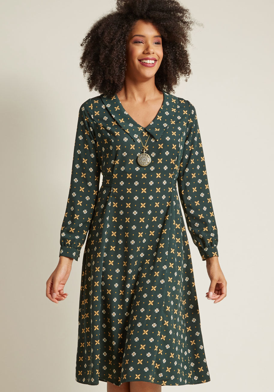 D906-01 - A workplace wonder, a darling for date night, a beautiful pick for brunch - this pine green midi dress is welcome