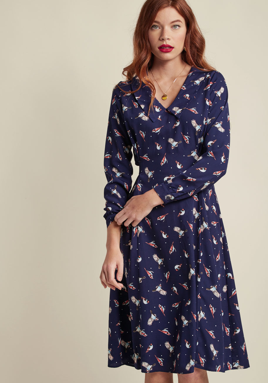 D906 - A workplace wonder, a darling for date night, a beautiful pick for brunch - this navy midi dress is welcome