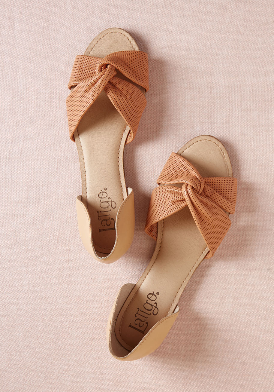 Darcy - A reminder to sport these leather flats from Latigo won't be necessary, for you'll be wearing them nearly nonstop! As comfortable as they are classy, these d'Orsay beauties tout cushioned footbeds, versatile, melon-esque hues, plenty of perforations atop 