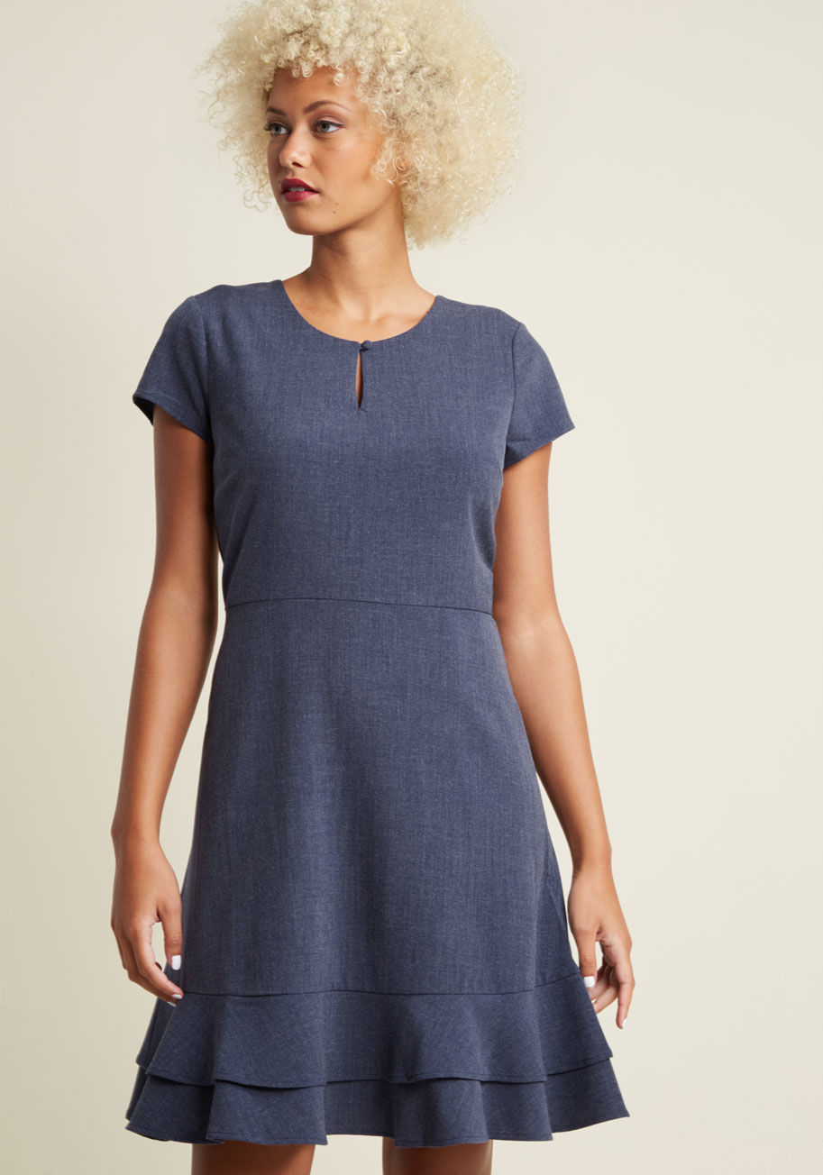 DB17090019 - Meeting with new clients means looking your most polished, which this muted blue dress aids with effortlessly! The ultimate look for networking and sealing deals with its short sleeves, keyhole neckline, and ruffled, tiered hemline, this woven beauty sign