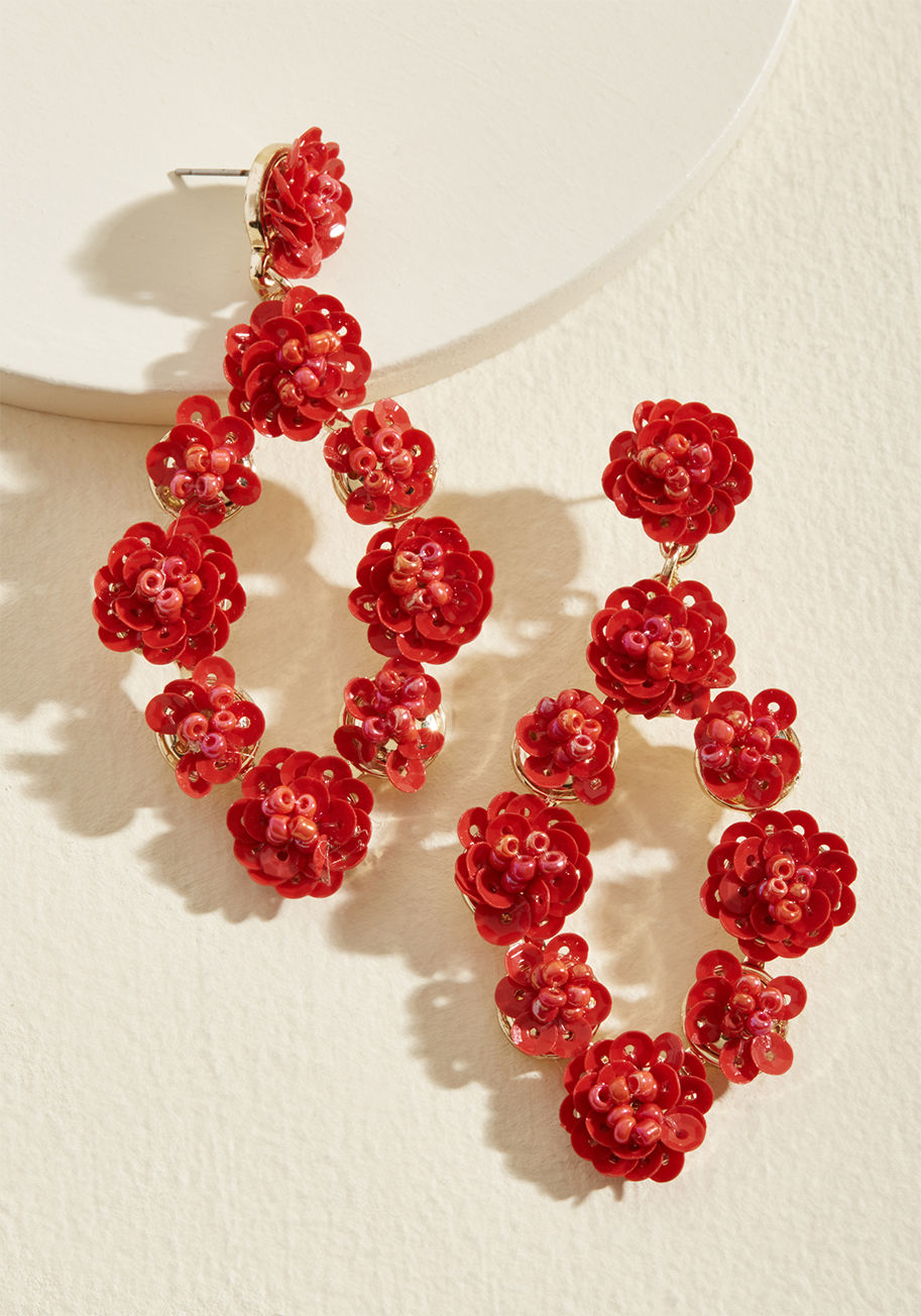 EA63343R - Gushing over how much you adore flaunting these red earrings isn't lip service - it's genuine elation, and the way your style following feels is mutual! Thoughtfully arranged sequins and beads form a floral motif atop the dangling gold frames of this femi