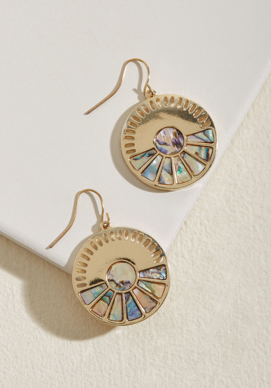 EA66642 - Once you lay eyes on these golden earrings, your outlook on accessories will be broadened! Each dangling disc flaunts a series of cutout notches and a fanning out of mother-of-pearl-inspired inlays, offering a vibe both beachy and blissfully retro.