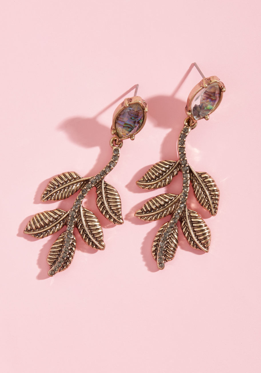 EA66967 - These antiqued gold earrings are a joy to work into your fancy ensembles. And, once you style their mother-of-pearl-inspired studs, smoky rhinestone stems, and textured leaves for the first time, you'll be quick to fancy up