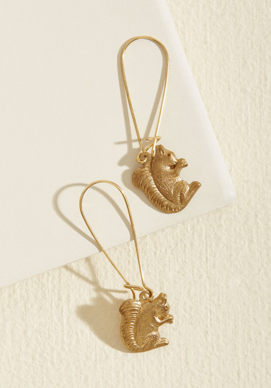 EC031 - May we suggest these squirrel earrings as your next nature-inspired style? With comfortable loops and stamped brass charms, this nickel-free pair infuses quirk and cuteness into your look.