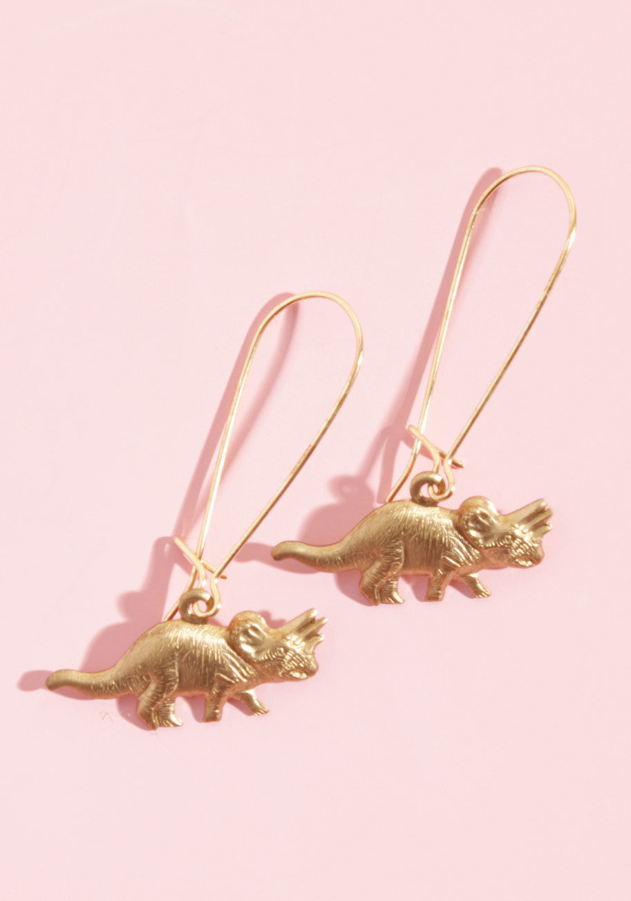 EC033 - May we suggest these triceratops earrings as your next nature-inspired style? With comfortable loops and stamped brass charms, this nickel-free pair infuses quirk and cuteness into your look.