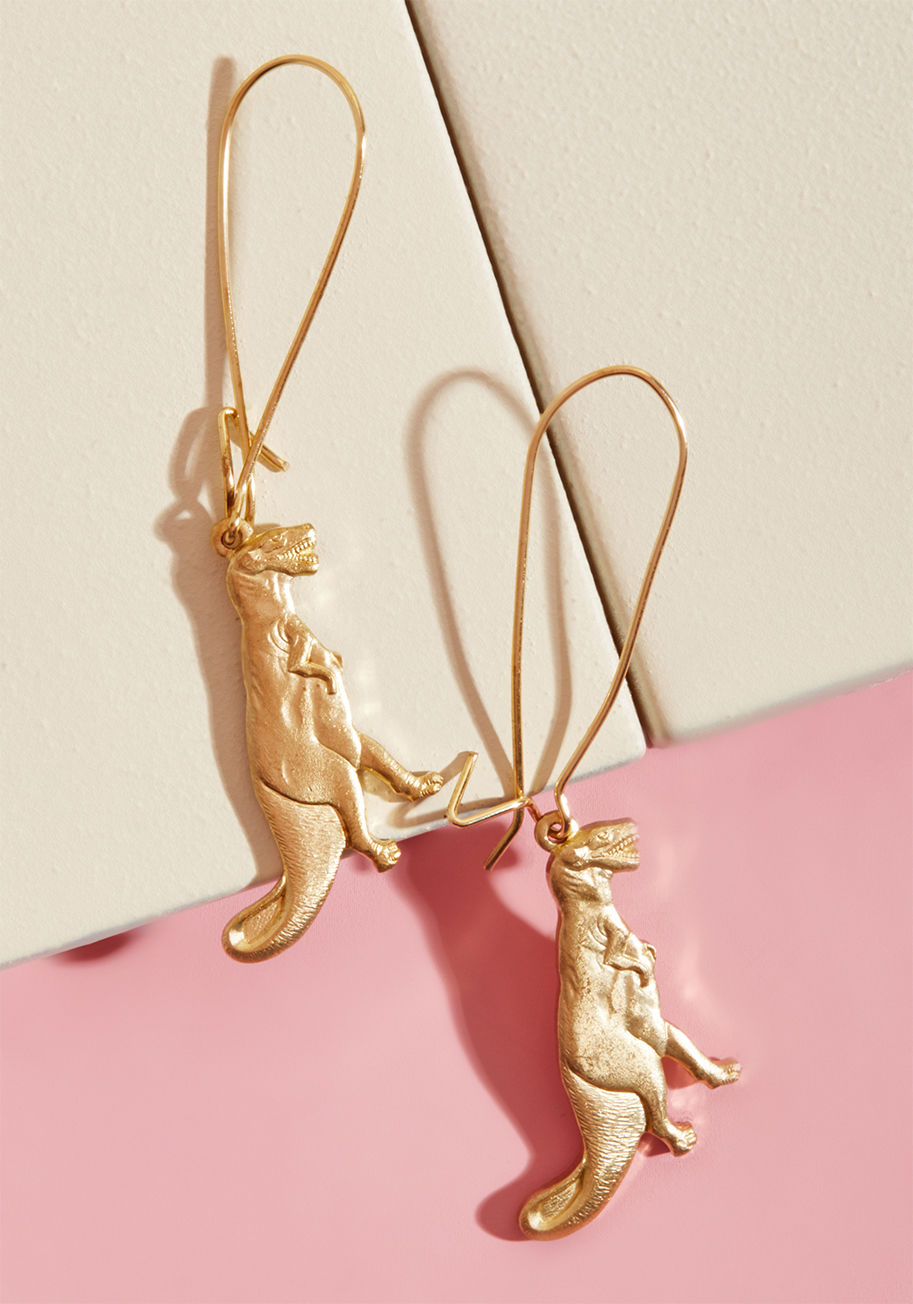 EC044 - At a distance, others can tell you've got your lobes glammed up with some sweet gold earrings. Upon closer inspection, they'll be delighted to discover that your dangling pair - crafted from nickel-free brass