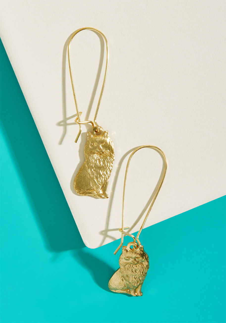 EC184 - May we suggest these cat earrings as your next nature-inspired style? With comfortable loops and stamped brass charms, this nickel-free pair infuses quirk and cuteness into your look.