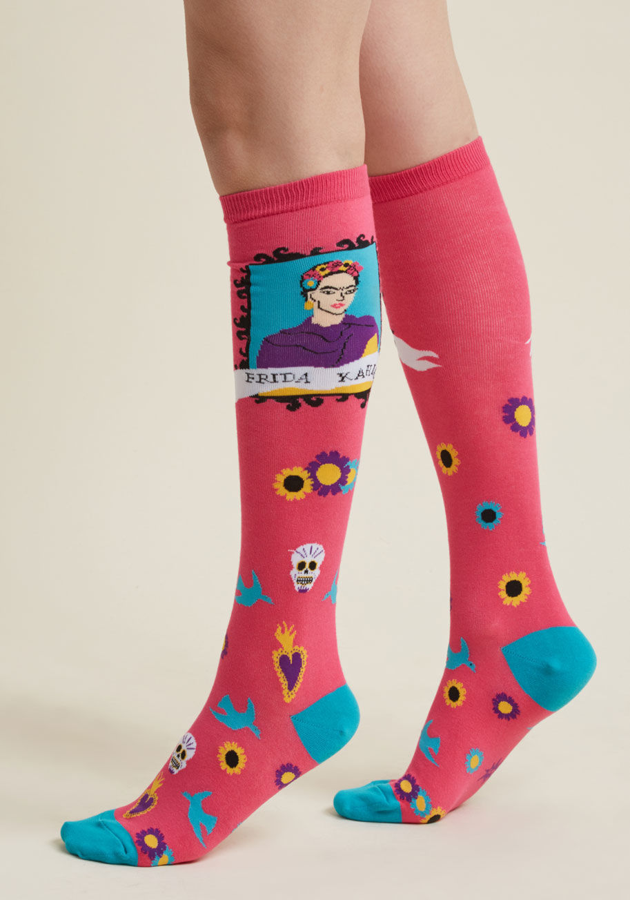 F0367 - Seeing the bright pop of pink from these knee highs may come as a surprise, and that's just where the fun begins! Leave your fashion following mystified by styling up the flowers, calaveras, birds, and flaming hearts of this bold pair, and feel as iconic 