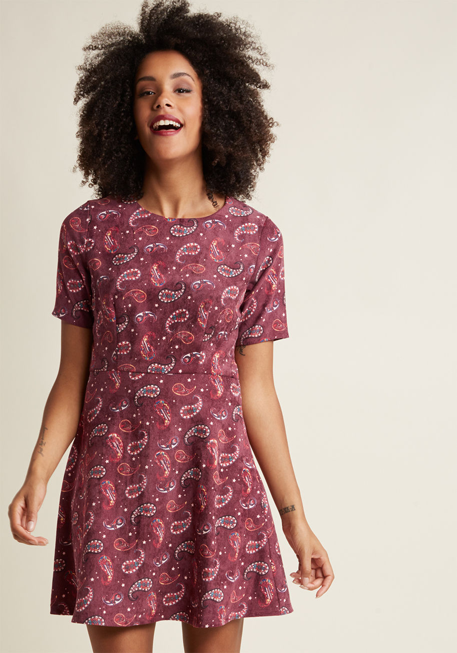 FA17HAN25 - Are you getting giddy while examining every element of this burgundy skater dress from Compania Fantastica? It's totally understandable. We get pretty worked up over velvety corduroy fabric, jewel-toned paisley, and flirty, skater-style silhouettes, too! 