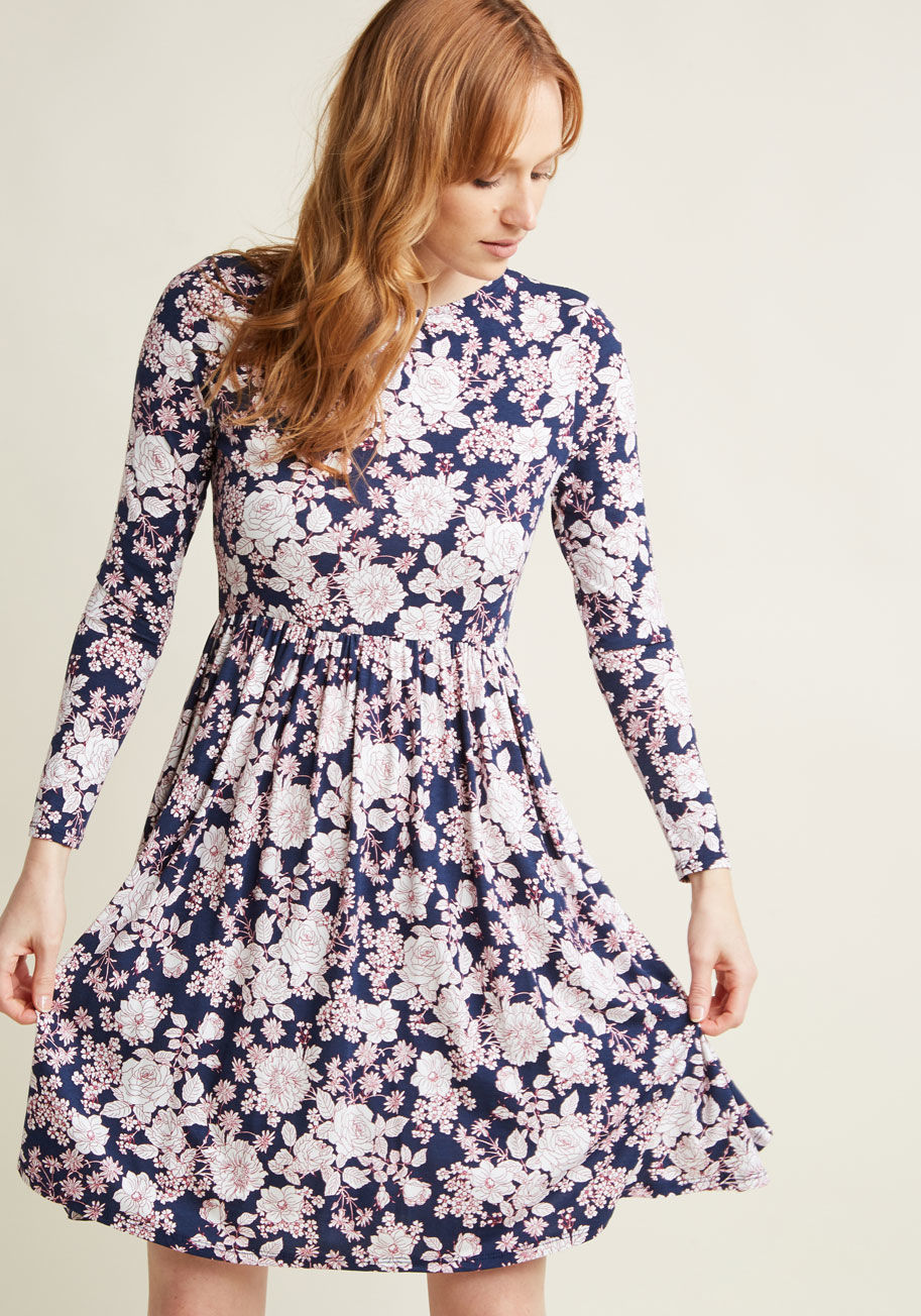 FA17MCD1396B - This jersey knit dress gives off the vibe of being perfectly pulled-together, but it's secretly seriously comfortable as can be. Jump into the magenta-and-white floral pattern of this navy blue frock from our ModCloth namesake label and accessorize its ga