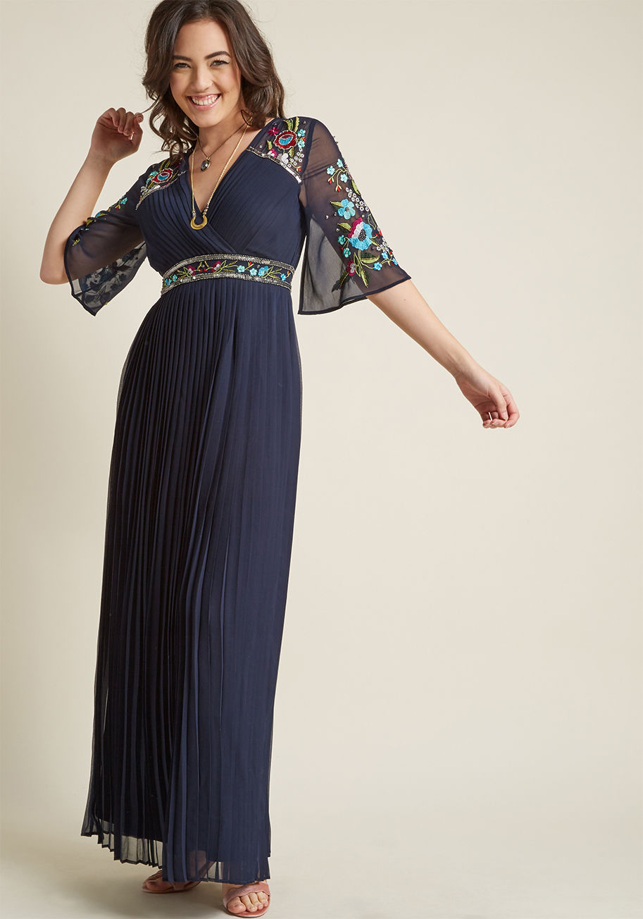 FFSW34AR - The room is noticeably brighter when you're around - could it be your presence, or the beads and sequins of this navy maxi dress? We venture to guess it's both! A stunning number for opulent moments, this chiffon gown does your shining self justice with i