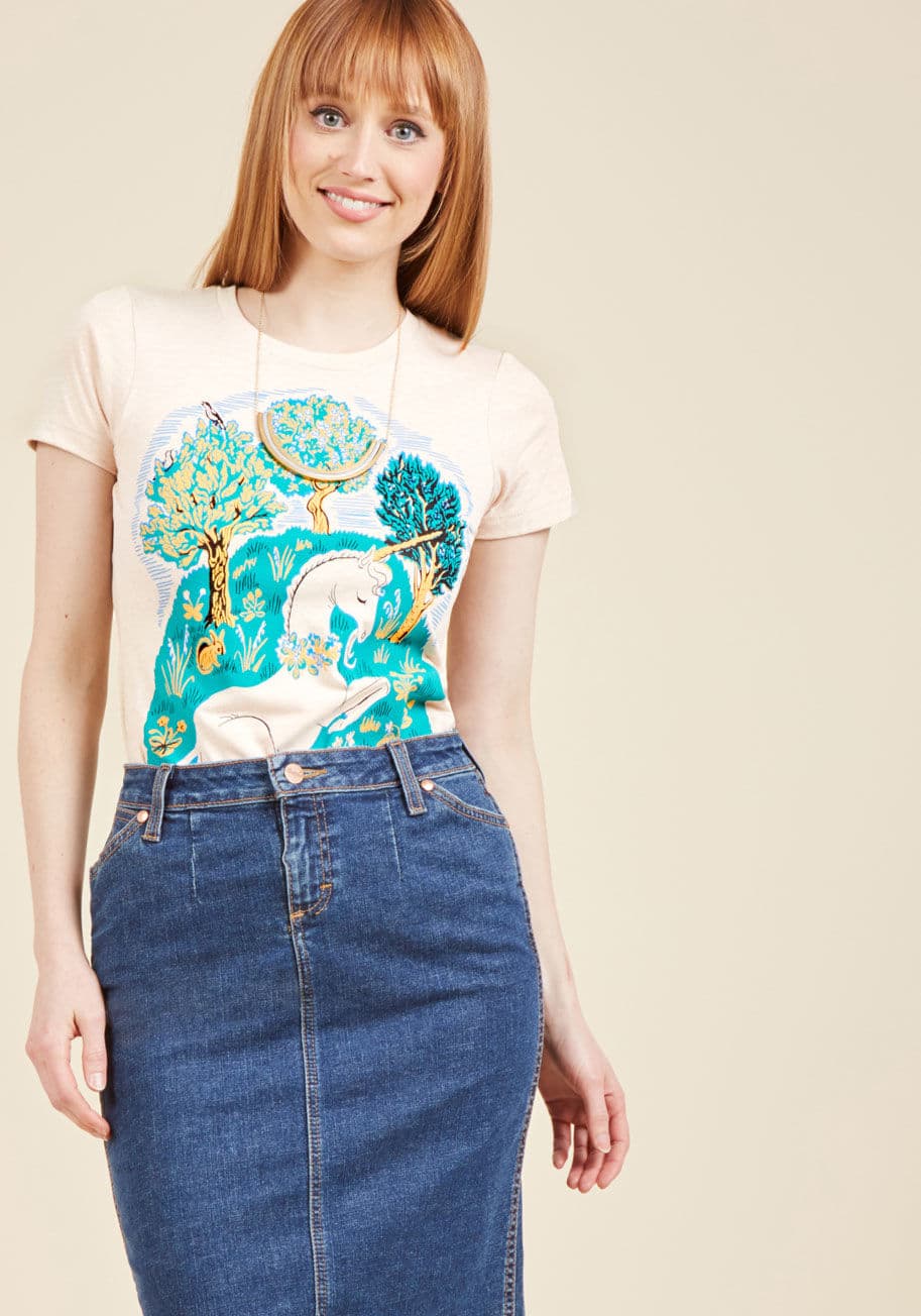 Field of Dreams - With a graphic as whimsical as that of this unicorn-printed T-shirt, how could you possibly pass it up? Lush trees, marigold rabbits, and soft green grass frame the horned heroine of this cotton-blended top, creating an imaginative look that just can&rsqu