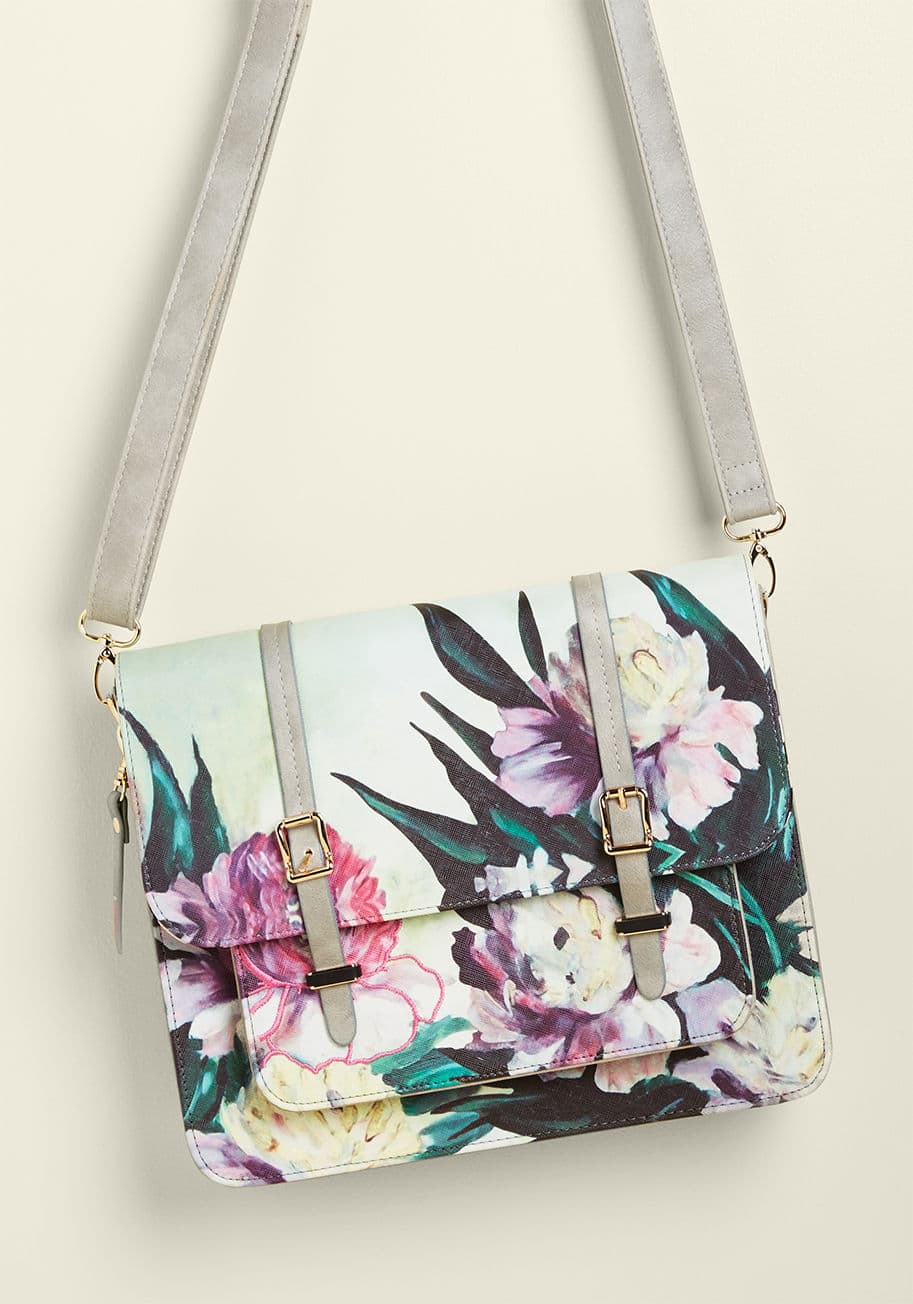 FRASATGY - Tossing your sketchpad and favorite pen into this lavender, grey, and mint floral satchel by Disaster Designs is a sure way to start any artful outing off with a bang! Adorned with gold hardware and multicolored blooms that capture the look of brushstroke