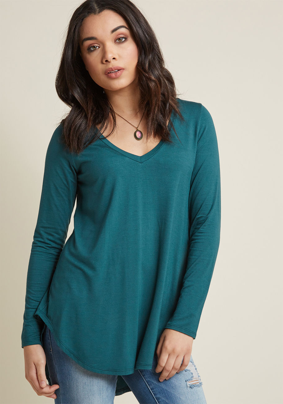 FT-1213 - Layer it on or let it stand alone as the star of your outfit - however you style this simple green, you're bound to look adorable! With a V-neck, a soft jersey knit, and a curved high-low hemline, this ModCloth-exclusive, long-sleeved top takes the cake a