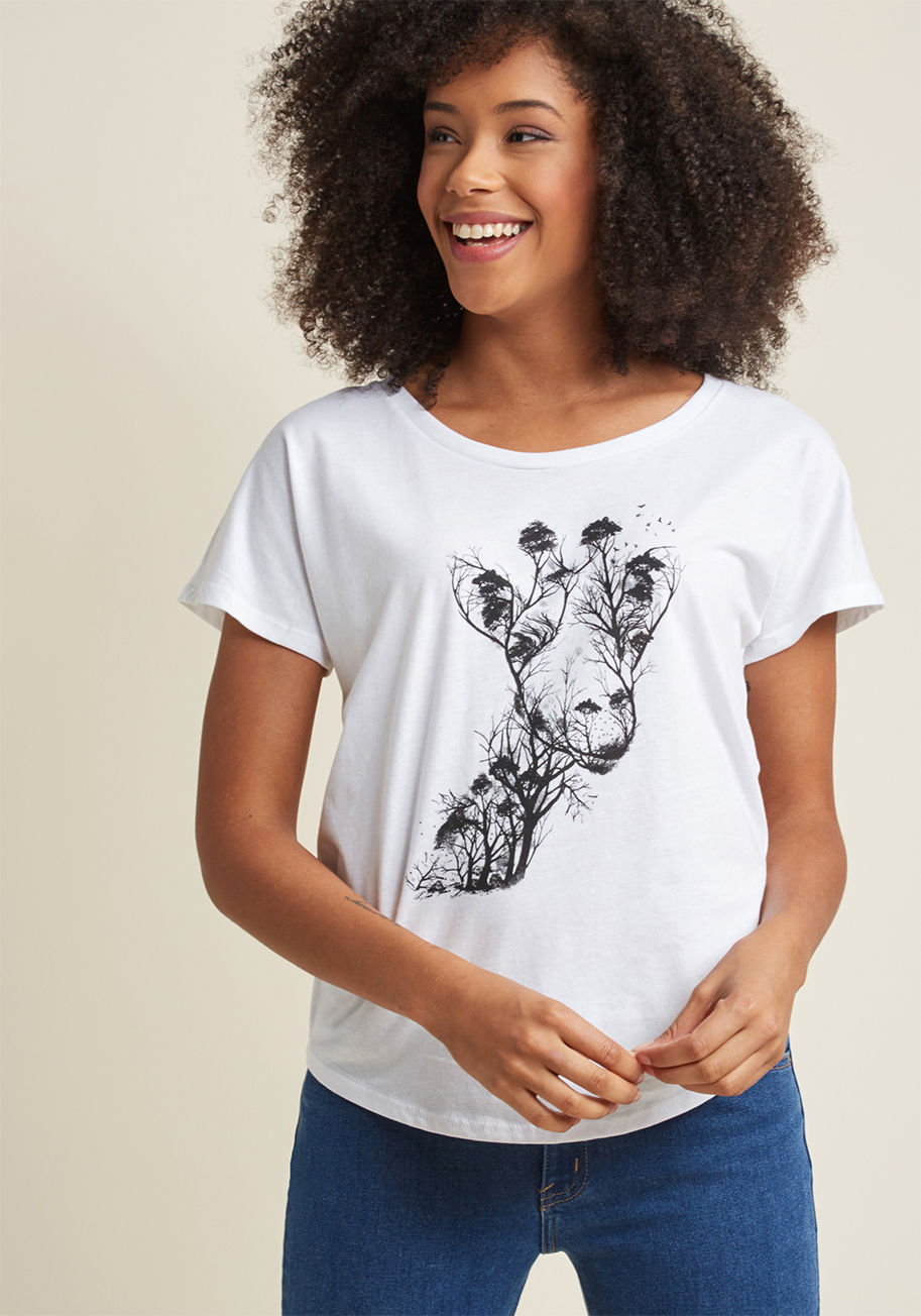 Giraffe Wildlife - If you're new to critter-printed style, we recommend beginning your journey with this white graphic tee! A ModCloth exclusive, this soft T-shirt employs a black giraffe motif crafted from lush leaves and branches, and seamless short sleeves for a relaxed 