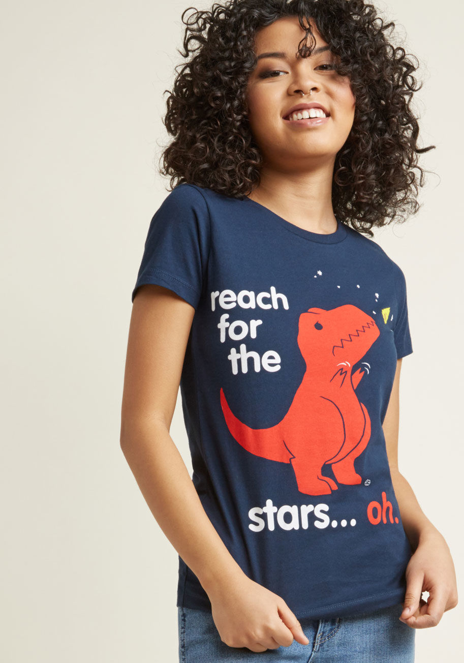 GT7618-102 NVY - Warning - we advise approaching this navy graphic tee with a sense of humor and a light heart! With its sad-yet-silly screen print of a T. Rex doing its best, this quirky top prompts both sweet snickers and full-on roars of laughter.