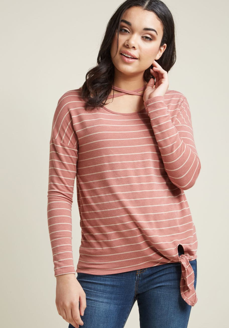 HT7051-2 - A delightful lunch with friends is made even lovelier by sporting this long sleeve tee. As you catch up with past pals, the wide neckline, crossing back straps, and tied hem of this dusty-rose-and-white striped top serve as a reminder that your style has 