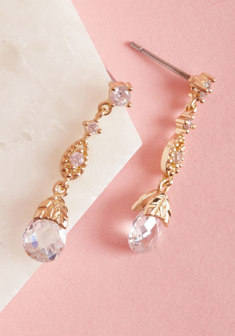 IMG-1859 - No need to fantasize about delicate gold earrings affixed with sparkling rhinestones - they're right here waiting for your next fancy affair! A ModCloth-exclusive pair, these posts dangle delightfully, featuring crystalline droplets and endless elegance.