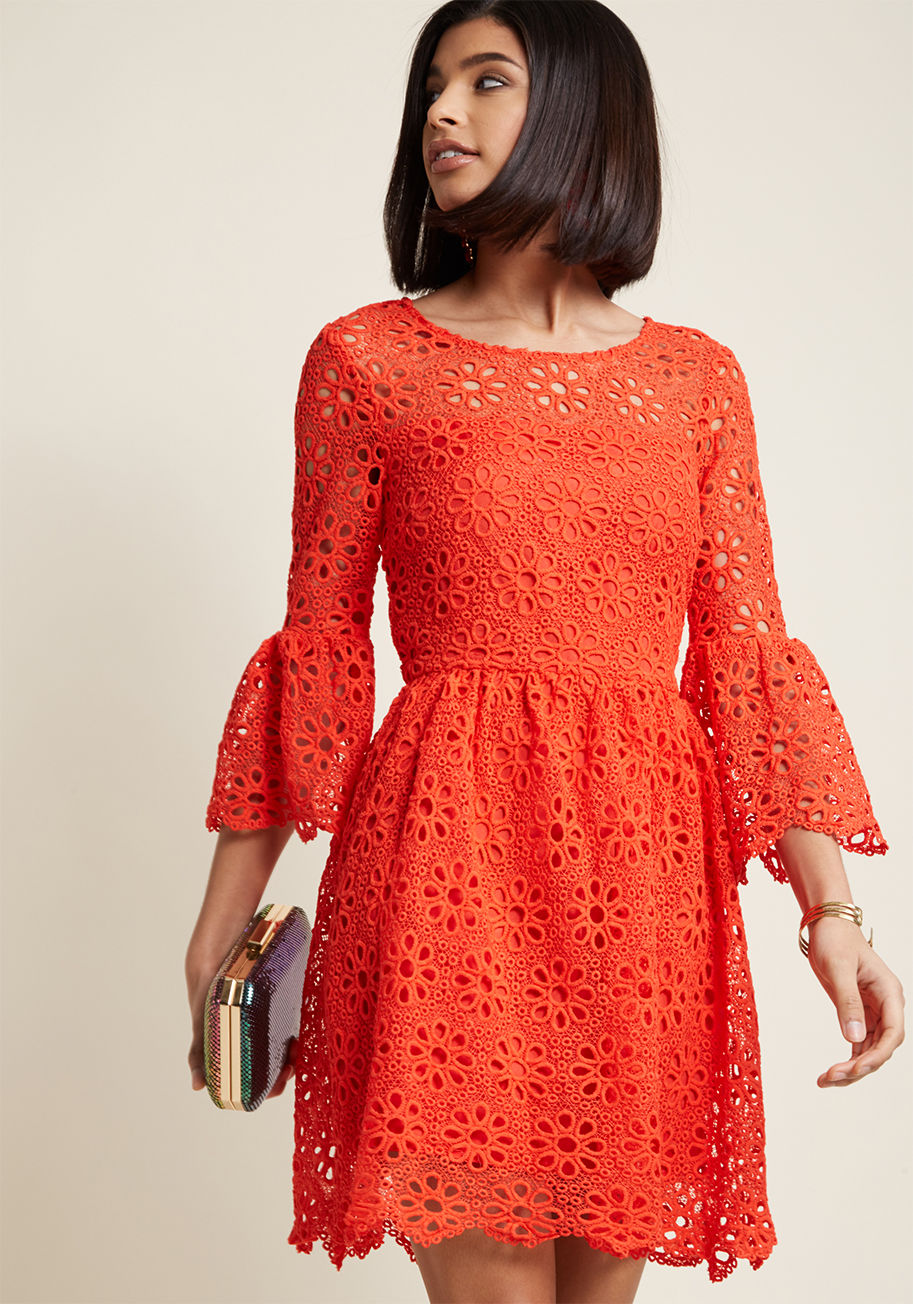 JI108577 - Daring and feminine with a twist of retro influence - that's your desired aesthetic, and that's exactly what this poppy red dress achieves! From Jack by BB Dakota, this eyelet beauty projects your essence through its sheer neckline, cropped bell sleeves, 