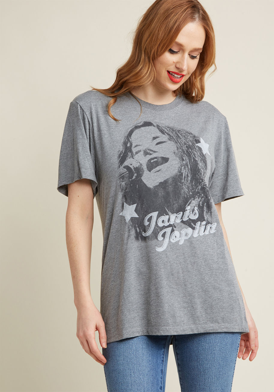 JNS0025-521GR - The vintage-inspired screen print on this Janis Joplin tee may be faded, but you'll be fresh and ready to dance to your favorite throwback tunes with its soft jersey knit against your skin! With a loose fit and a starry ode to the activist rocker, this he