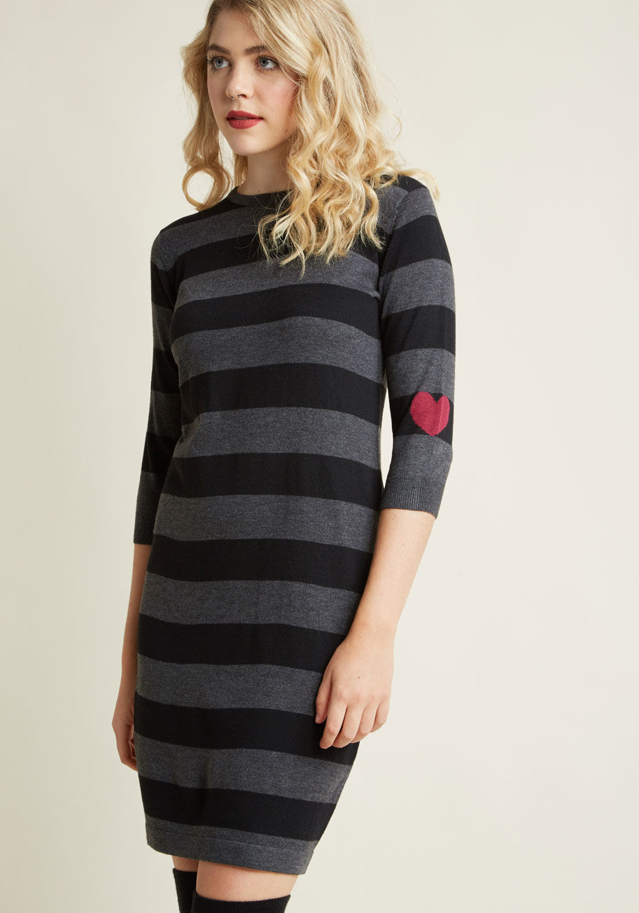 K0036 - The frock before you is more than just a striped sweater dress - it's a truly unique treasure! From Sugarhill Boutique, this black and grey sheath is made special with a crew neckline and a single magenta intarsia heart atop one of its cropped sleeves for